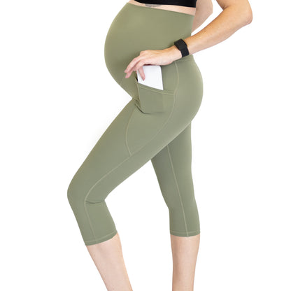 Olive green maternity leggings with pockets, completely specialised for comfort and style