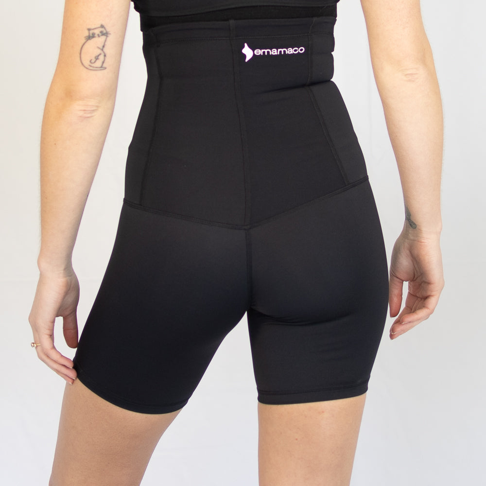 High-waisted black compression shorts with branded waistband from Introducing Emamaco