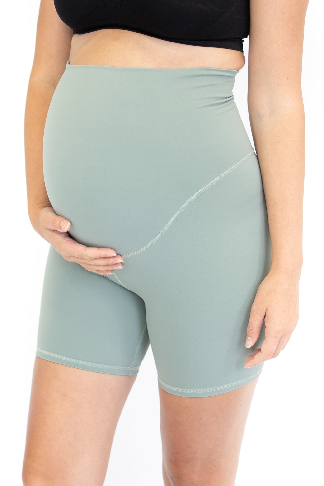 Mint green high-waisted emama maternity bike shorts perfect for pregnant life