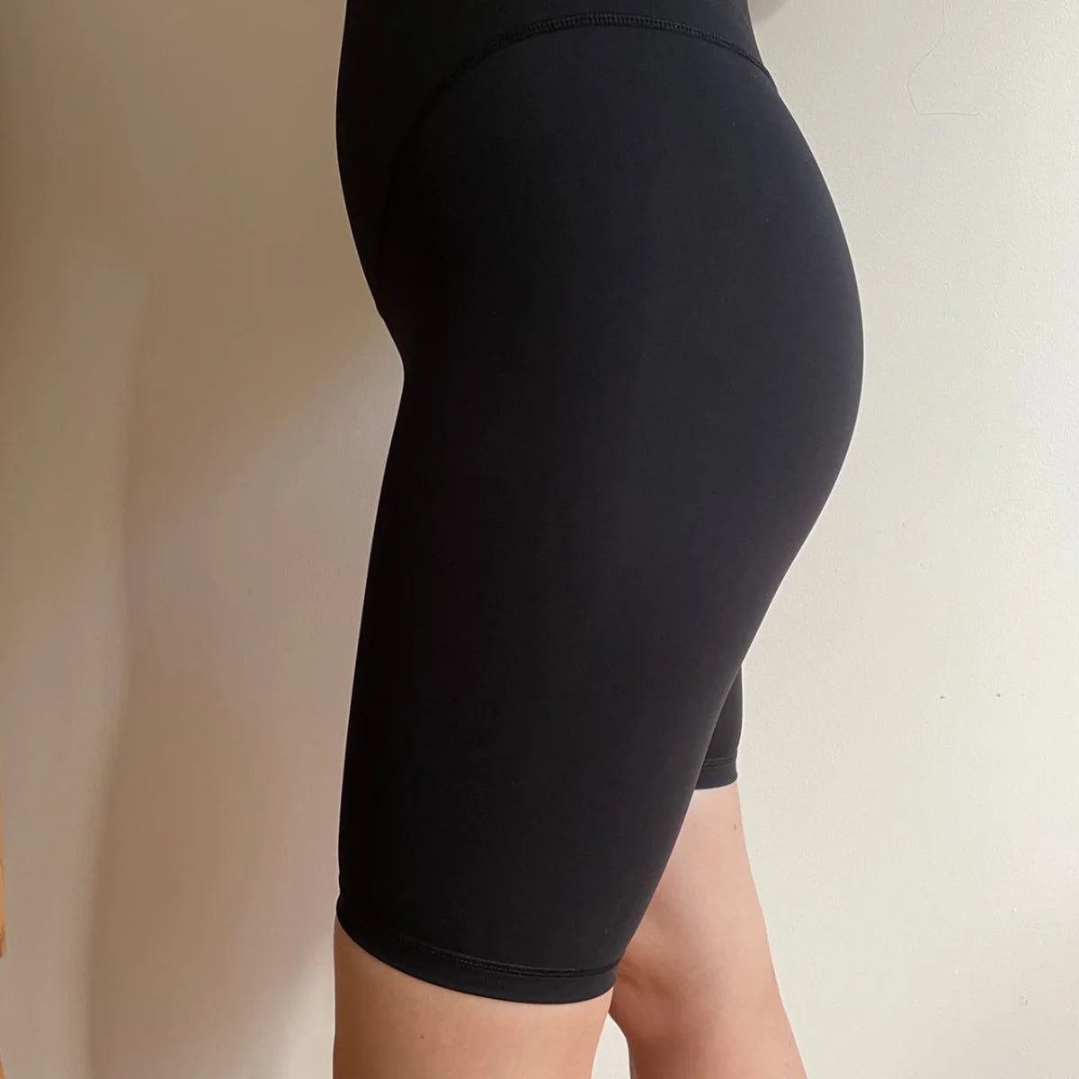 Black Emama Maternity Long Shorts with Pockets for stylish exercise and comfort