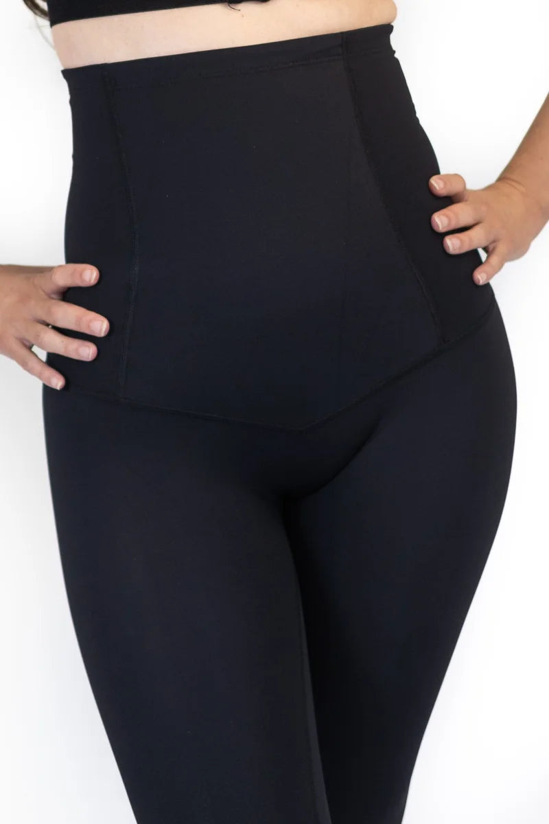 High-waisted black shapewear leggings for pregnancy recovery and post partum support