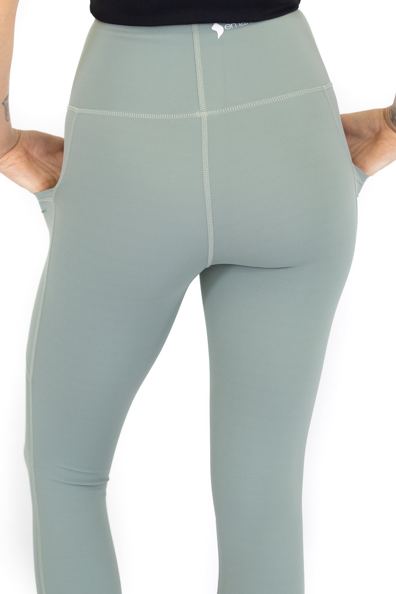 Light sage green high-waisted leggings with pockets on final sale, limited sizes remaining